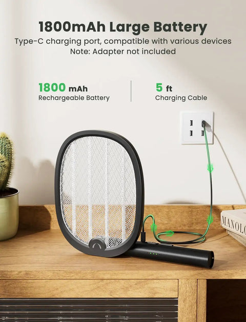 Foldable Electric Fly Swatter Racket 2 In 1 Mosquito Killer With Purple Attractant Light Rechargeable 1800mAh on table