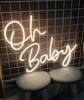 Dimmable LED Neon Sign With Transparent Acrylic Backplate, warm white neon "Oh Baby" sign, waterproof silicone LED strips