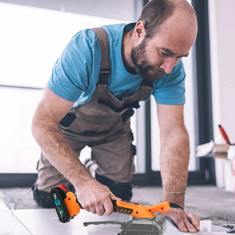 Man using Tile Vibration Leveling Tool With Suction Cup Handheld Vibrator For Plug And Play No Fuss Install on floor tiles
