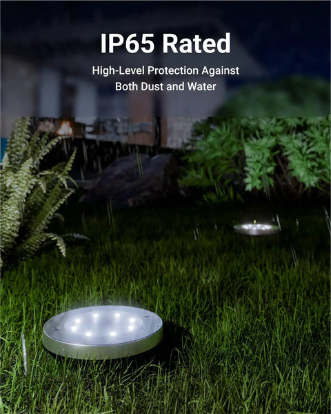 12 Pack Solar Path Lights Outdoor LED Garden Lights Waterproof Dusk to Dawn Landscape Pathway Stakes 7000K Diamond White IP65 Weatherproof for No Fuss Easy Setup Yard Patio Deck and Walkways in grass at night with IP65 rating