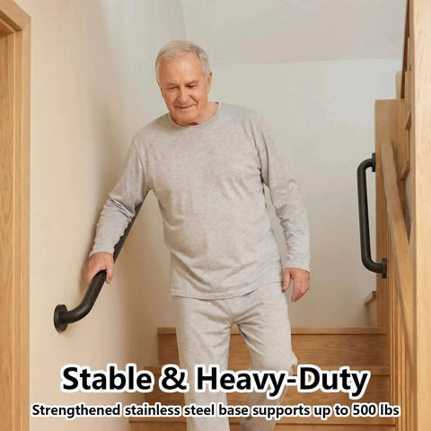 Hella Secure 12 Inch Stair Handrail And Wall Mounted Safety Grab Bar For Indoor Outdoor Steps providing a tight non slip matte black grip while heavy duty stainless steel frame handles 500 pounds with no sweat, installed near staircase.