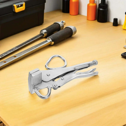 Auto Body Frame Pulling Clamp with Extra Wide Duckbill Jaw on a workbench