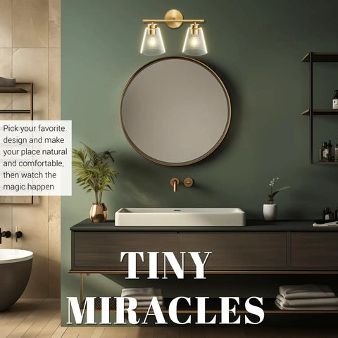 2 Light Gold Brass Vanity Wall Lights Over Mirror With Clear Glass Shades For Bathroom Kitchen And Living Room Durable Anti Rust Finish Damp Location Rated Modern Sconce Lighting installed above bathroom mirror.