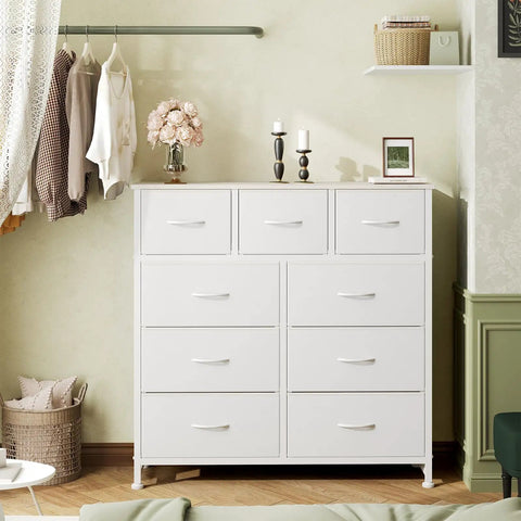 White 9 Drawer Dresser With Fabric Bins Sturdy Metal Frame And Wood Top A Totally Functional Storage Organizer For Bedroom Guest Room Closet Or Entryway Big Capacity Chest Of Drawers That Fits Any Space against wall with decorative items on top