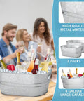 Two Pack 4 Gallon Galvanized Ice Buckets For Parties with beverages, highlighting metal material and 2-pack design