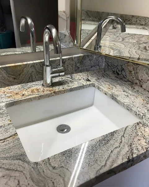 Compact White Ceramic Undermount Bathroom Sink 16.54 By 12.87 Inches With Overflow Rectangular Vanity Lavatory Basin installed in countertop
