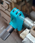 Universal Thread Repair Tool And Restorer For All Threads In Range Five Eighths Inch To One And A Half Inches External Or Internal Threads Metric And SAE One Hand Tool Quick Sizing Chases And Repairs Threads installed on a metal thread