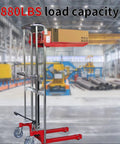 Heavy Duty Manual Hydraulic Pedal Driven Stacker Lift Truck With Robust Forks For 800 Lbs Warehouse Pallet Moving And Stacking Jobs with box load at 880LBS capacity.