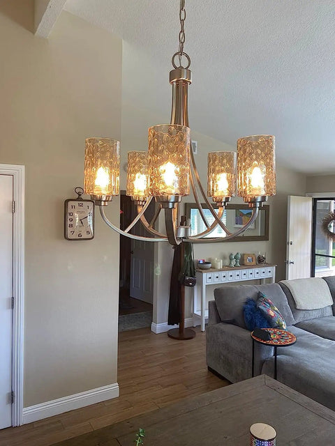 Living room with modern chandelier featuring Frosted White Linen Cylinder Glass Lamp Shade Replacement Globe Pack.