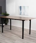 Heavy Duty VIVO 4 Leg Black Electric Dual Motor Standing Desk Frame For 60-130 Inch Tops with wood top in modern office