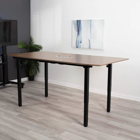 Heavy Duty VIVO 4 Leg Black Electric Dual Motor Standing Desk Frame For 60-130 Inch Tops with wood top in modern office