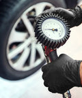Heavy Duty Black Nitrile Disposable Gloves Medium 8 Mil Thick 100 Pack Latex And Powder Free Industrial Safety Gear used for checking tire pressure.