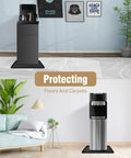 Non-Slip Silicone Water Cooler Mat With Raised Edge For Floor Protection Under Water Dispenser 22 By 19 Inches Spill-Proof Mat keeps floors dry in living room with green plant and carpet.