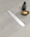 36 Inch Linear Shower Drain With Removable Wave Pattern Grate, Matte Black 304 Stainless Steel Floor Drain in tiled shower floor