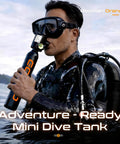Diver using 0.5L Mini Scuba Tank Portable Backup Air for Snorkeling and Training, Refillable Emergency Pony Bottle in shallow water.