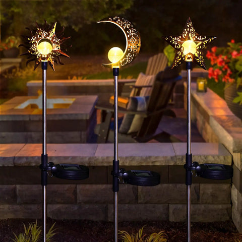 Celestial Solar Garden Stakes Set With Moon Sun Star Lights For Lawn Pathway And Flower Beds, 3 lights glowing at night