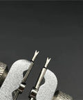 Watch Repair Kit 6pcs Aluminum Alloy Tools Set with V shaped polished tips for band pins in close-up view.