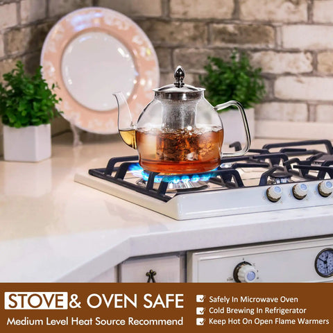 1 Liter Glass Teapot With Removable Infuser, Stovetop Safe Blooming And Loose Leaf Tea Maker on a gas stove.