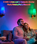 Couple enjoying Stepeak Vintage Gold Wireless Wall Sconces Battery Operated with vibrant colors in cozy living room.