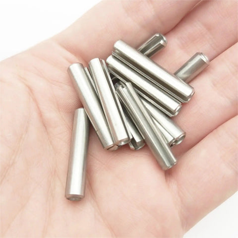Hand holding Spring Type Elastic Cylindrical Cotter Pin Set In 304 Stainless Steel Sizes From M1.5 To M10 Includes M1.5 M2 M2.5 M3 M4 M5 M6 M8 M10 Rust Resistant Durable Straight Pins For Machinery DIY Projects