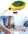 Spring Balancer Hanging Fixture Holder With Lock For Easy Tool Handling Pro Grade Portable Retractable Support 0.5kg To 1.5kg Weight Capacity Ideal For Workshops Garages And Job Sites, yellow metal housing with drill in use