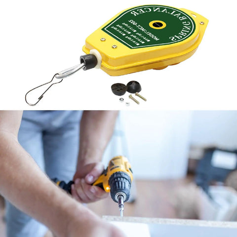Spring Balancer Hanging Fixture Holder With Lock For Easy Tool Handling Pro Grade Portable Retractable Support 0.5kg To 1.5kg Weight Capacity Ideal For Workshops Garages And Job Sites, yellow metal housing with drill in use