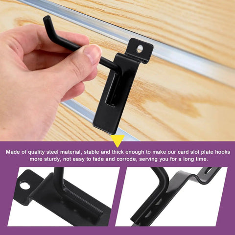 Close-up of a black 4-inch slatwall hook being installed on a wooden panel, part of the 20 Piece 4 Inch Heavy Duty Slatwall Hooks Kit For Garage Organization And Retail Display Slatwall Panel Hooks Gridwall And Pegboard Compatible Black Finish Durable Storage Hooks Set.