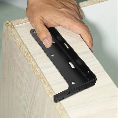 Heavy Duty Black Steel Floating Shelf Brackets 2 Pack being installed on wooden surface, showcasing concealed L-shaped design