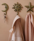Three Pack Vintage Cast Iron Wall Hooks In Dark Gold Antique Finish Featuring Sun Moon Star Celestial Shapes With Included Screws