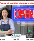 16.5 Inch By 9 Inch LED Neon Open Sign for Business above smiling person in apron, showcasing plug-in power options.