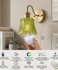 YUNICE Rechargeable Wall Sconces Set of 1 Battery Operated Wall Sconce with Remote Control Dimmable Cordless Wall Lamp with Green Glass Lampshade Antique Brass Wall Lights for Bedroom Living Room, displayed on wall.