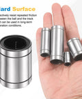 LM35UU Linear Ball Bearing Pair With 35mm Bore, 52mm OD, 70mm Length held in hand next to close-up of one bearing