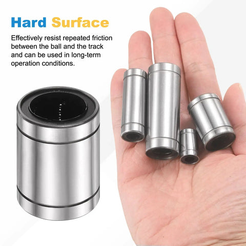 LM35UU Linear Ball Bearing Pair With 35mm Bore, 52mm OD, 70mm Length held in hand next to close-up of one bearing