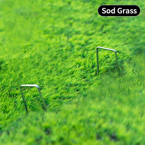 Heavy Duty 6 Inch U-Shaped Landscape Staples Set, 120 Pack, 11 Gauge Galvanized Steel Garden Stakes securing sod grass.