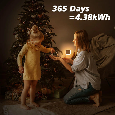 Sujeet wall-plug night light, warm white LED, installed in outlet beside Christmas tree