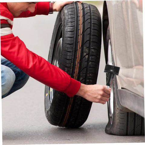 Man installing Spare Tire Bolt Retainer Clamp for Vehicle Wheels to secure tire on car, easy install tire hold down hardware.