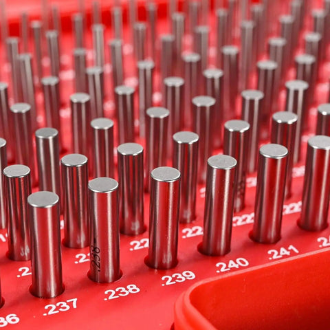 Pro Grade Pin Gauge Set M1 0.061-0.250 Inches, 190-Piece Class ZZ Steel Pin Gauges With Storage Case, Ultra Precise Measurement Tools With Tight Tolerances 0.0000 To -0.0002, HRC 60-62, close-up of steel pins in red case