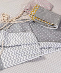 Fabric patterns for Chill Nylon Baby Hammock Swing For Indoor Or Outdoor Use, includes zigzag and polka dot designs.