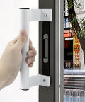 Person holding Two Pack 8 Inch Aluminum Sliding Door Handles For Glass Doors White Includes Four Mounting Screws Fits Six And Five Eighths Inch Mounting Holes For Patio Glass Door And Barn Door Durable Aluminum Build With Smooth Operation on a glass door.
