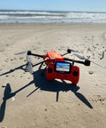 Beefy Heavy Lift Fishing Drone With 30 Minute Flight Time And 4K Sony IMX377 Camera on sandy beach