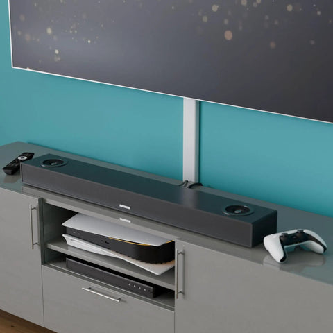 Slick Low Profile TV Wall Mount Cord Hider, Paintable Self Adhesive Cable Raceway For A No Sweat Install, Seamless Double Pack White Cover With Hidden Hinge For A Top Shelf Look, mounted with a soundbar.