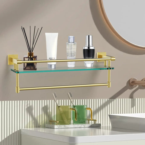 Pro Grade 20 Inch Wall Mount Glass Shelf With Towel Rack In Brushed Gold Finish holding toiletries in bathroom setting