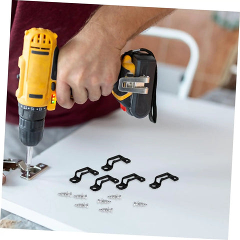 Man using a drill with black connectors, showcasing the Thirty Piece Hassle Free Furniture Connector Slide Buckle With No Sweat Tool Free Snap On Kit For Couch Sofa Wardrobe Cabinet And Bookshelf Hidden Joint Fastener Easy Home Diy Fix.