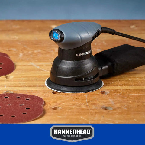 Workhorse 2.0 Amp 5 Inch Random Orbit Sander With 12000 OPM Quick Sandpaper Change in use on wooden surface