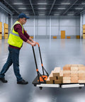 Heavy Duty Foldable Workbench With Smooth Caster Wheels Transforms Into Seven Flexible Workshop Modes Like Scaffold And Auto Repair Stand For No Sweat Garage Days And Weekend Project Hustle, shown in use transporting wood.