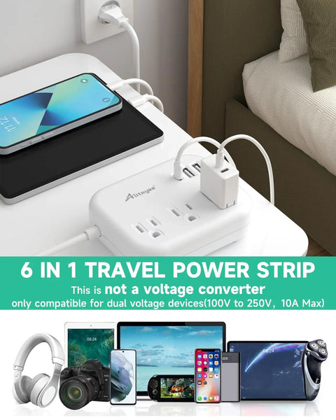 Grab And Go Global Travel Power Strip With Universal Plug Adapter, 3 outlets, USB ports charging devices on a table.