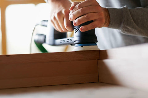 Person using a RO 90 DX sander with Three And A Half Inch Hard Pad For RO 90 DX Sander That Keeps Edges Crisp And Flat Built To Last