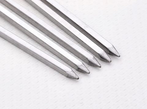 Close-up of stainless steel 10-inch square barbecue skewers, 12-pack, Amazon brand