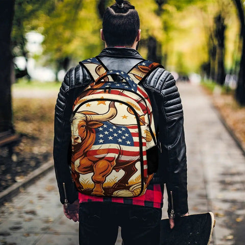 Person wearing Farmland Patriotic Bull Print Unisex Backpack Large Capacity Durable Polyester Daypack with flag design outdoors.