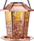Solar Powered Bird Feeder For Outdoors Hanging Built Tough Premium Metal Construction Chew Proof Weather And Water Resistant Garden Decor Lantern By Night Dope For Yards And Patios with intricate floral design glowing at night.